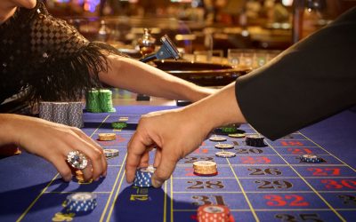 娛樂城輪盤下注場景，玩家在賭桌上放置籌碼